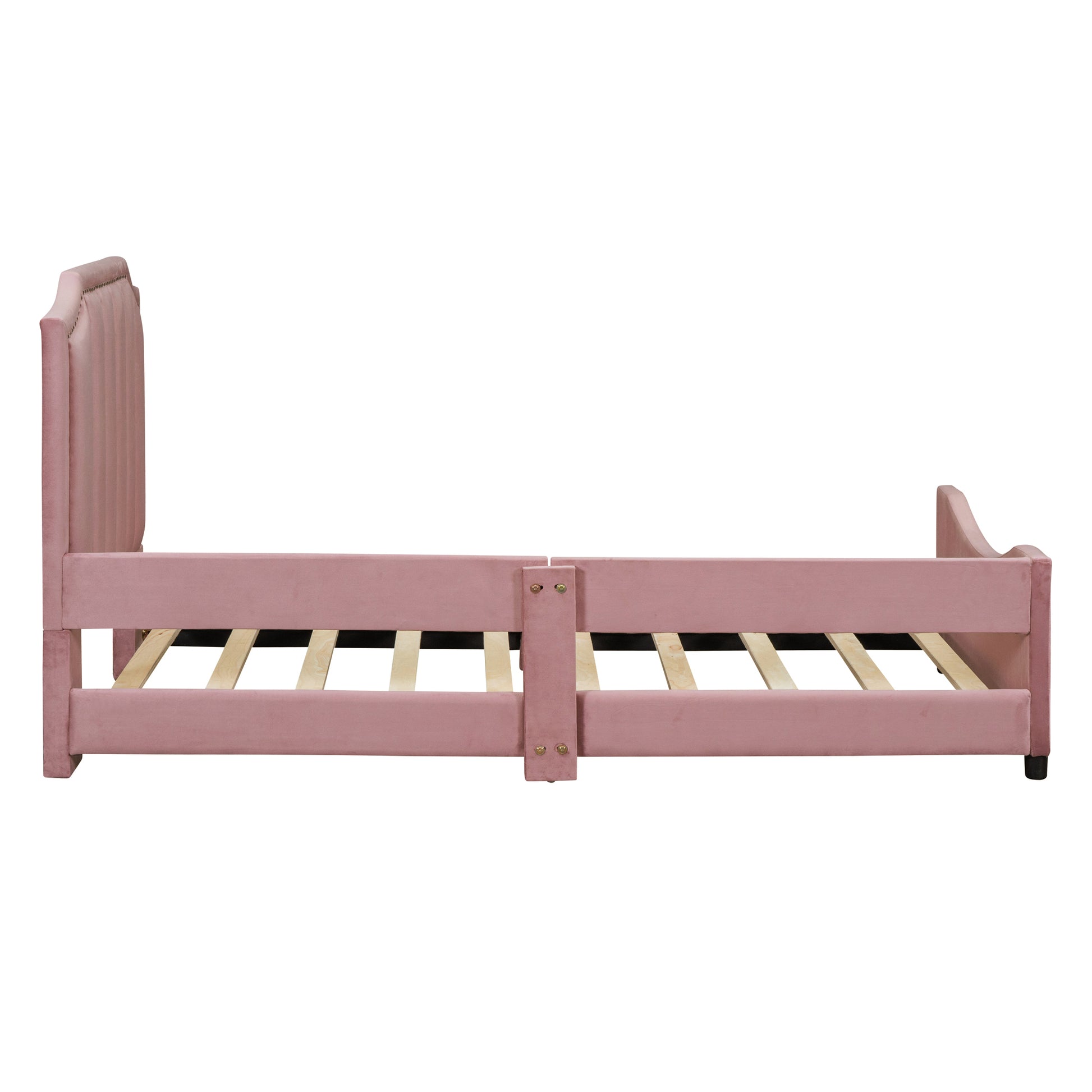 Pink velvet upholstered twin bed frame with tufted headboard and slatted base