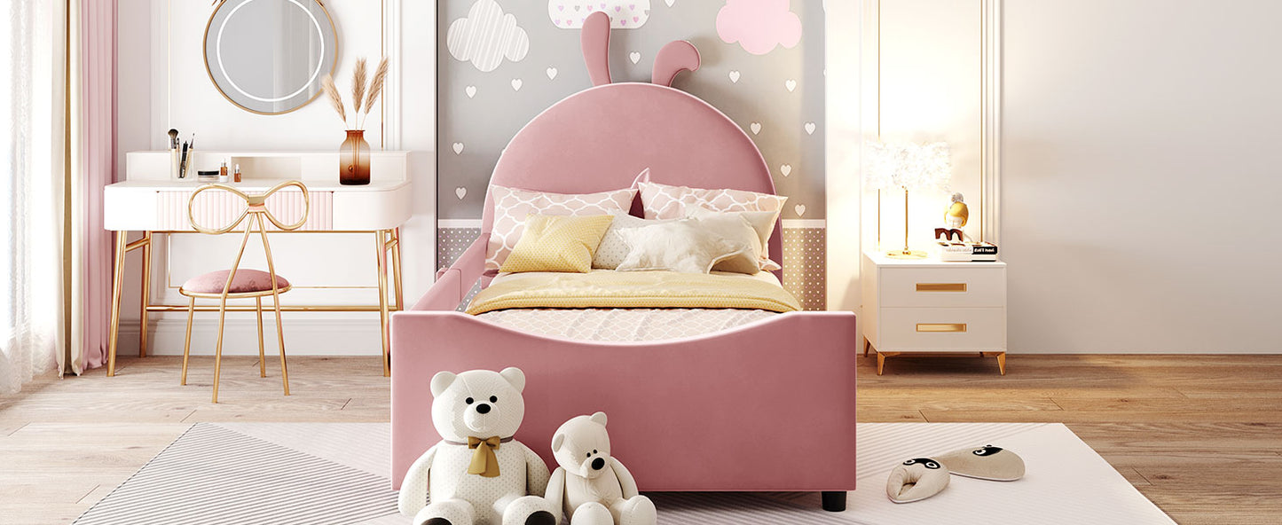 Pink velvet toddler bed with bunny ears headboard