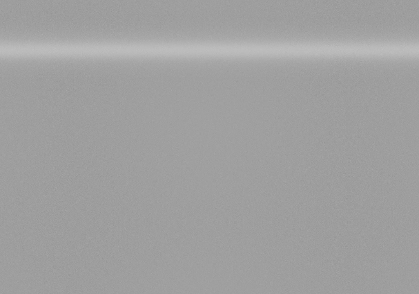 Brushed stainless steel refrigerator door with subtle horizontal reflection