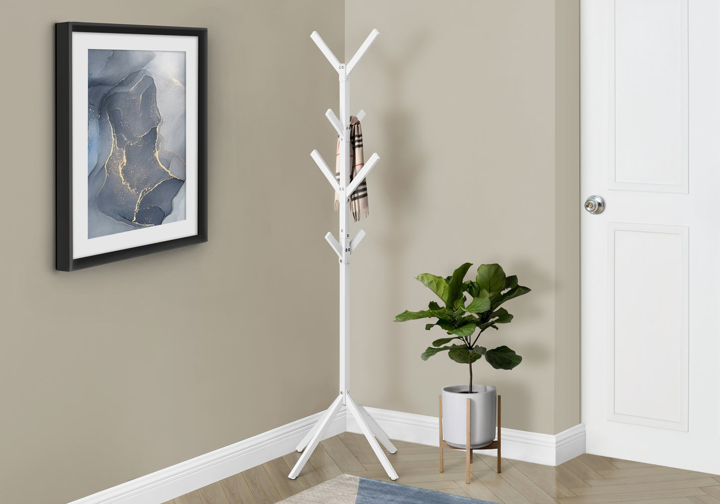 White metal coat rack with scarf hanging