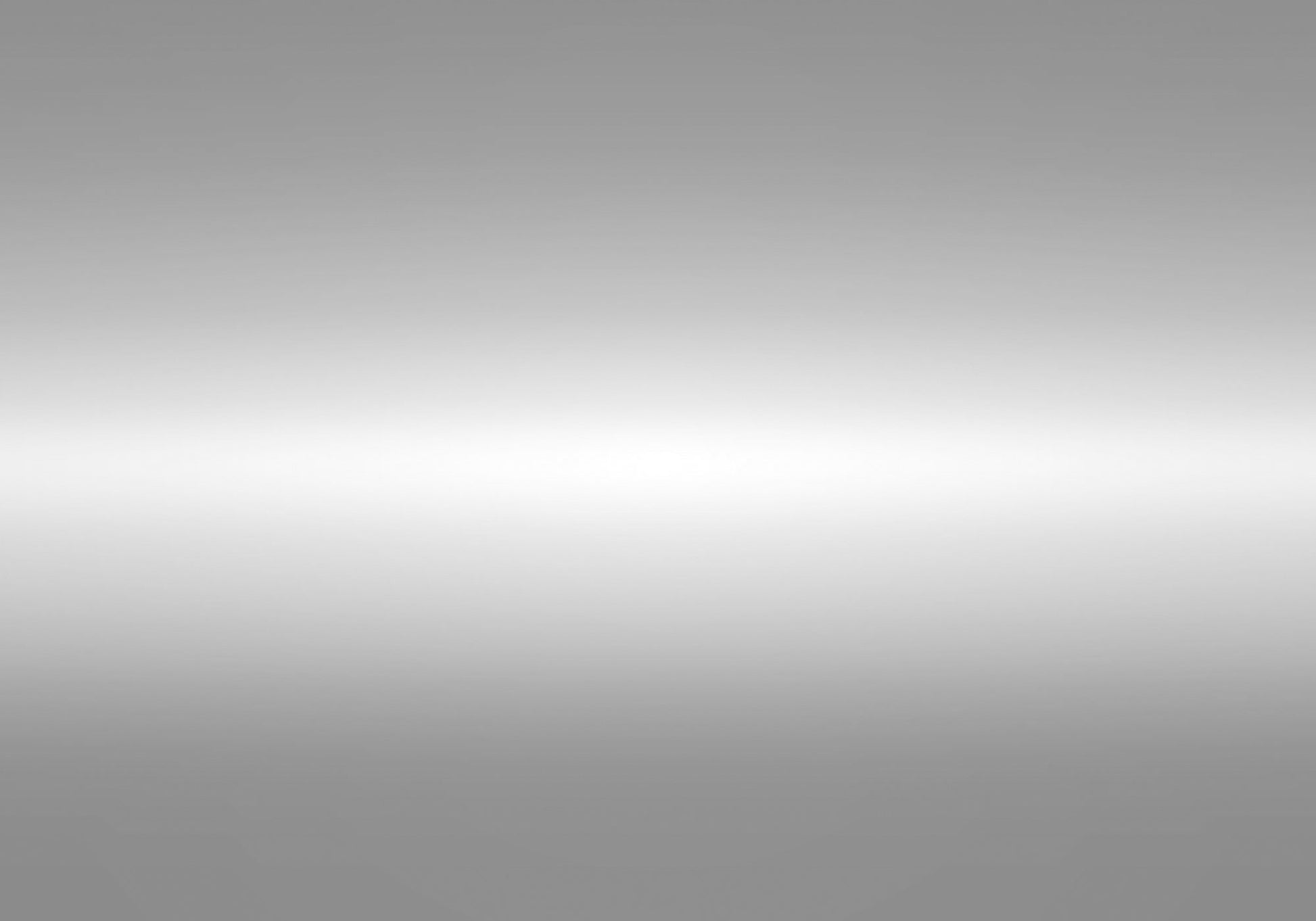 Silver brushed metal background with bright horizontal highlight