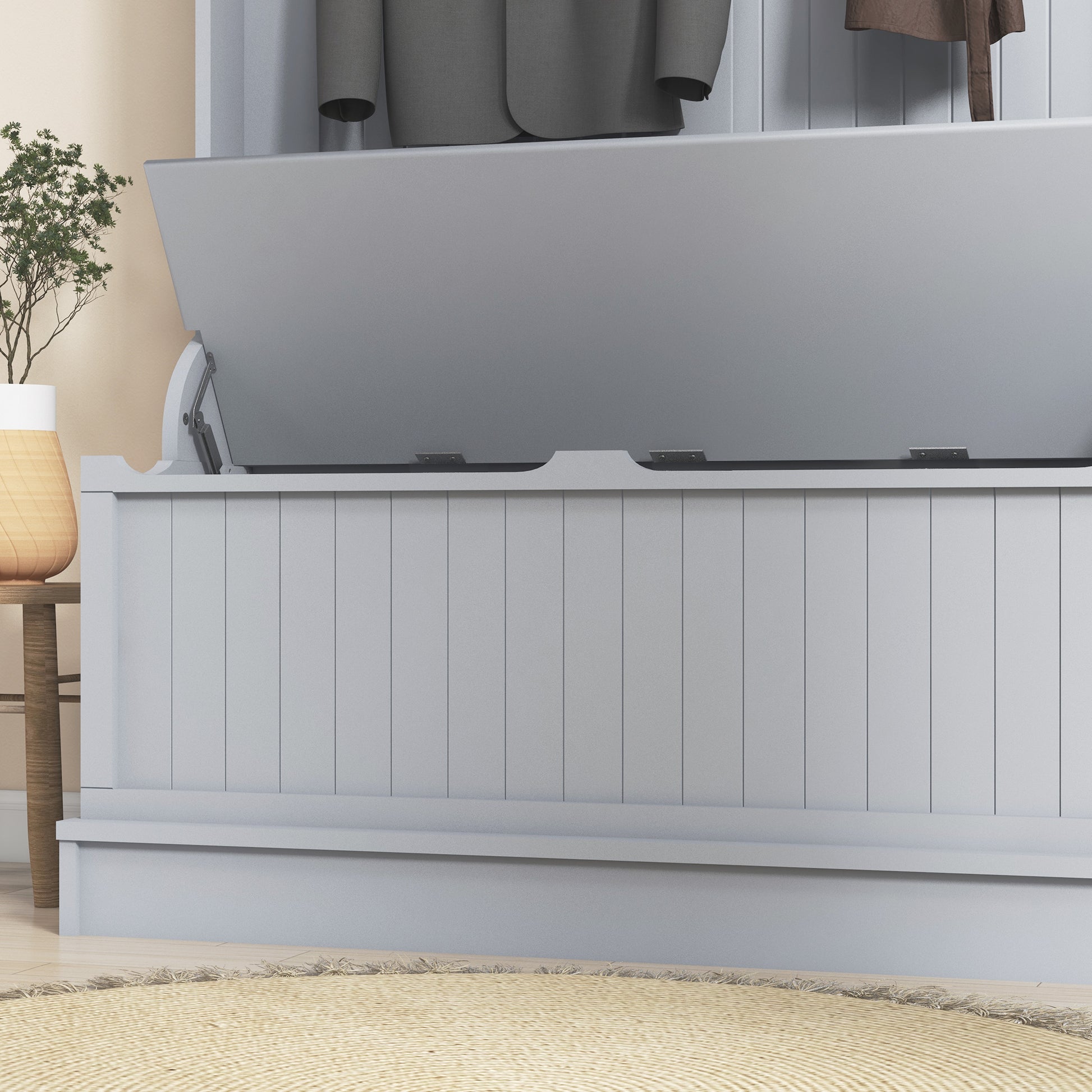 Light grey wooden storage bench with lid open revealing storage