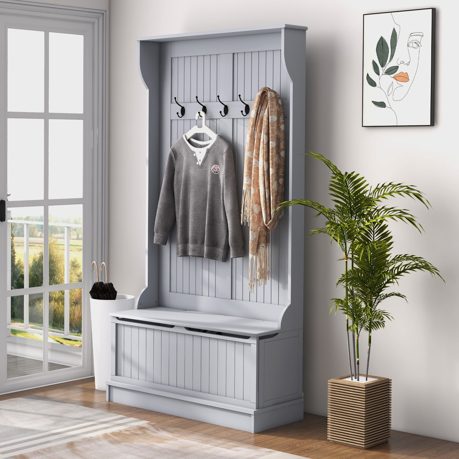 Gray wooden hall tree with storage bench and coat hooks