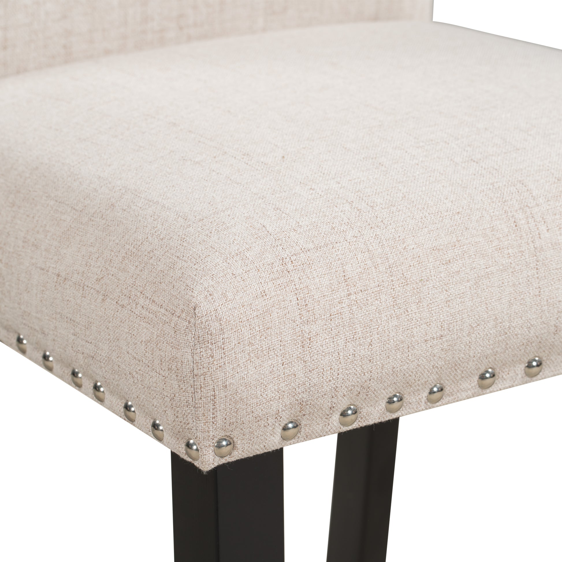 Beige linen upholstered seat with silver nailhead trim