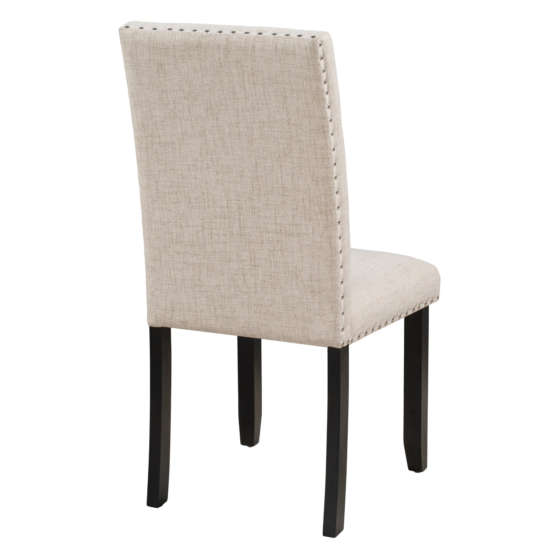 Beige upholstered dining chair with nailhead trim and dark wood legs
