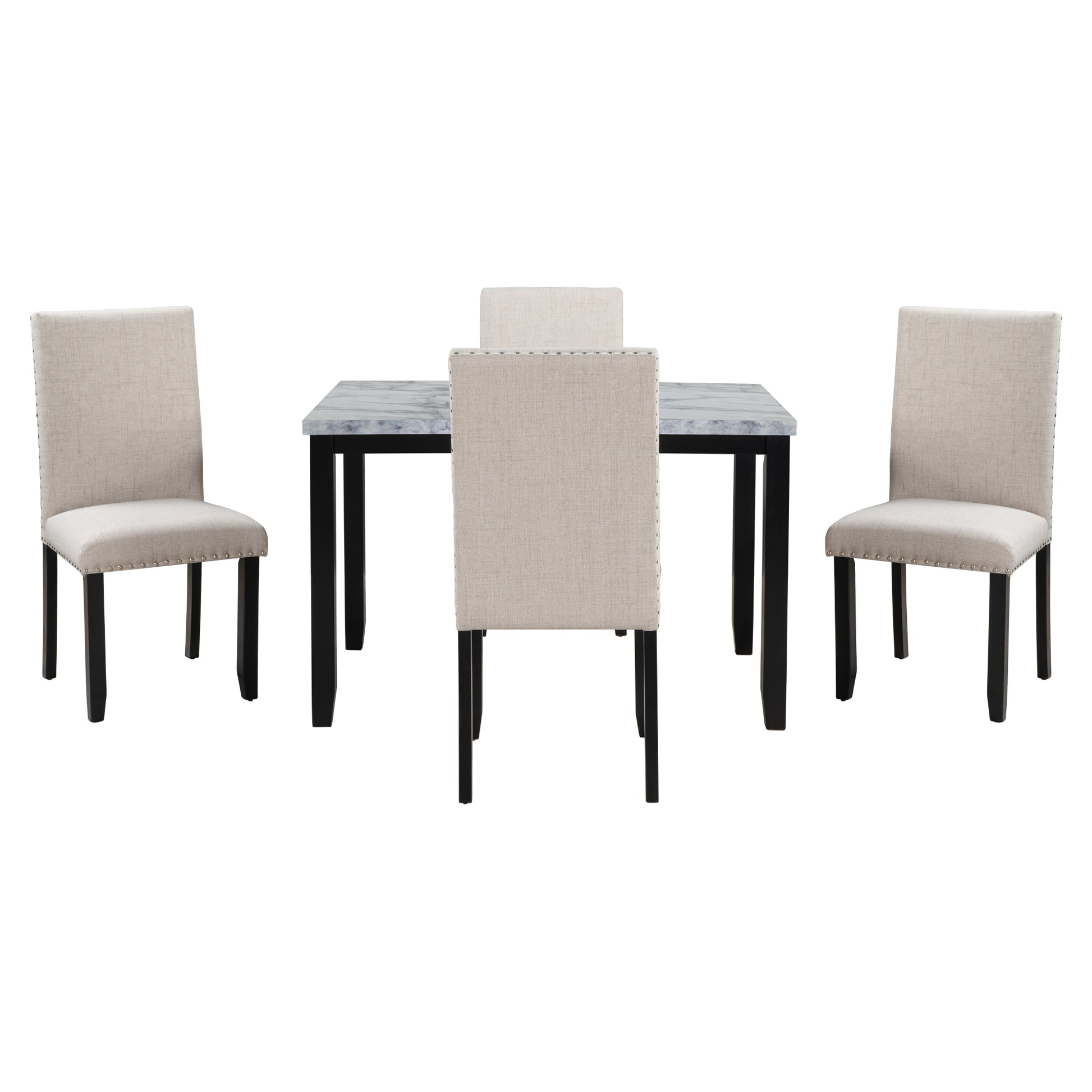 Beige upholstered dining chairs with nailhead trim surround a faux marble top dining table with black legs