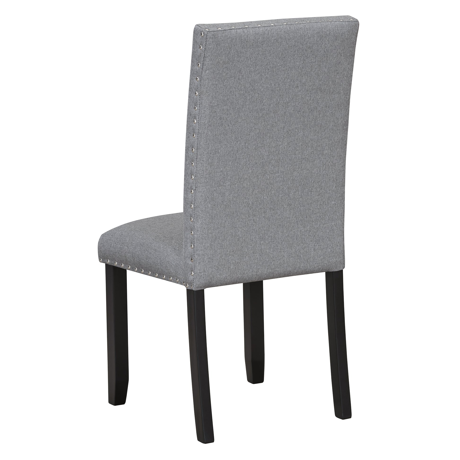 Gray upholstered dining chair with nailhead trim and dark wooden legs