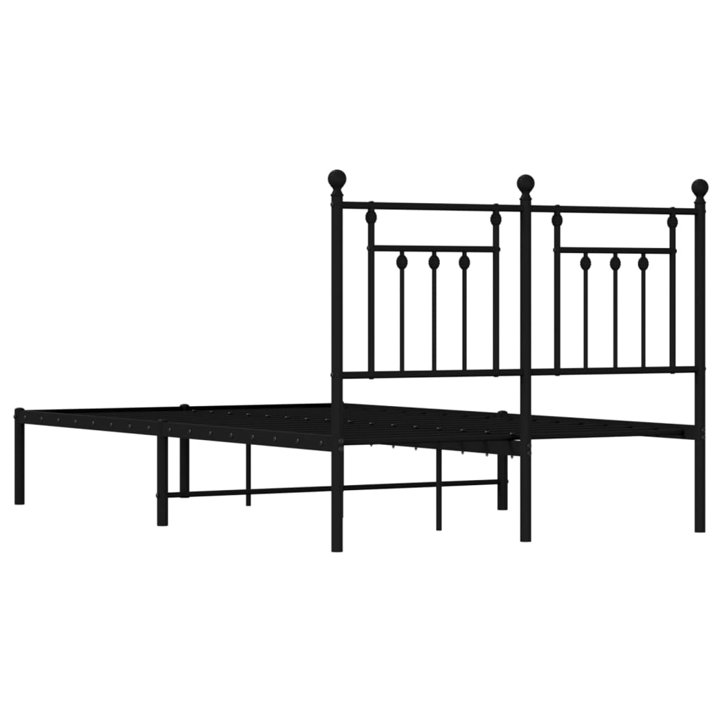 Black metal twin bed frame with decorative finials and slat support
