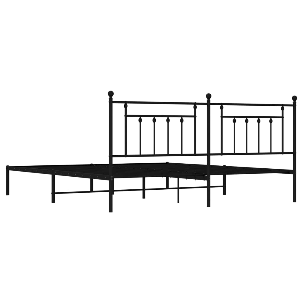 Black metal queen bed frame with decorative finials on the headboard