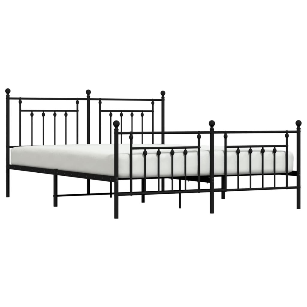Black metal king size bed frame with ornate headboard and footboard