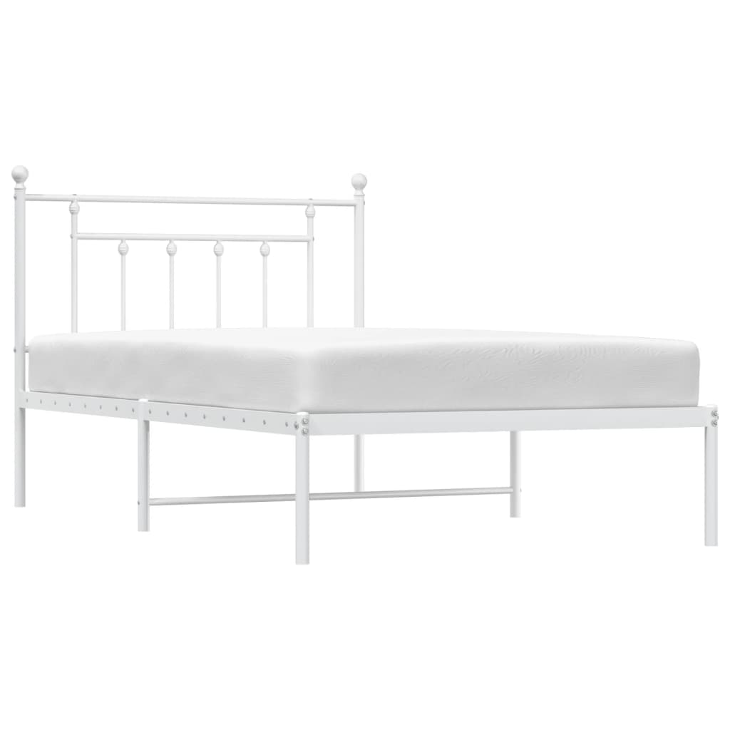 White metal twin bed frame with rounded headboard posts