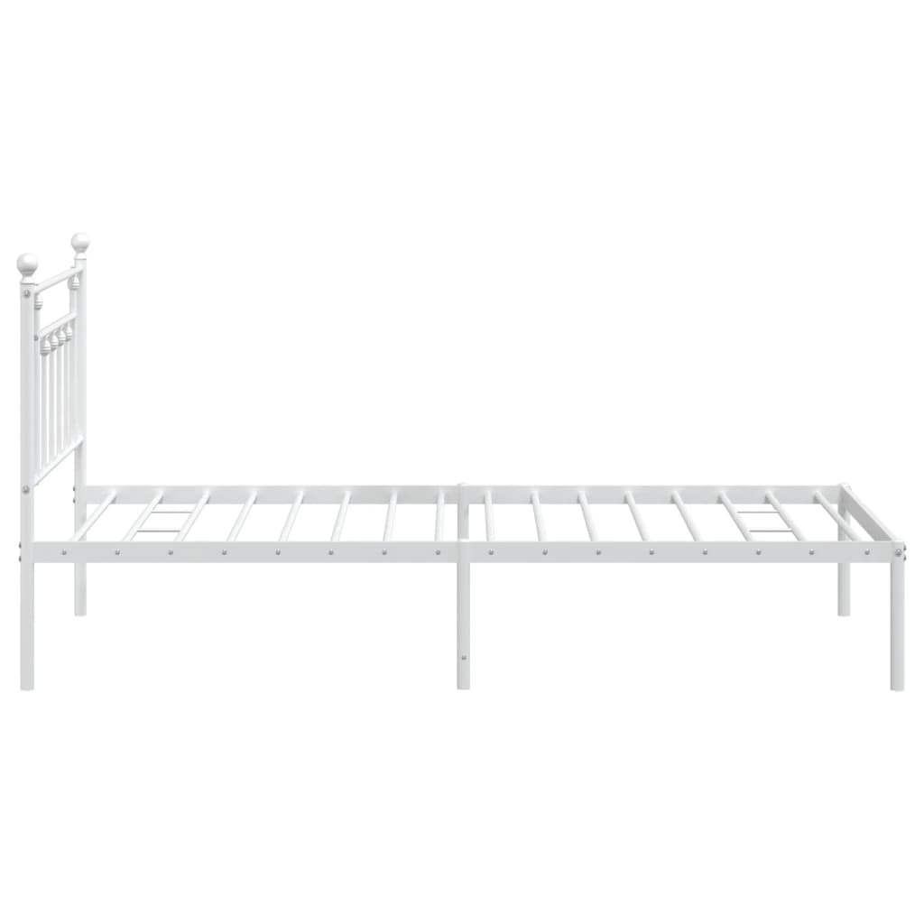 White metal twin bed frame with ornate headboard