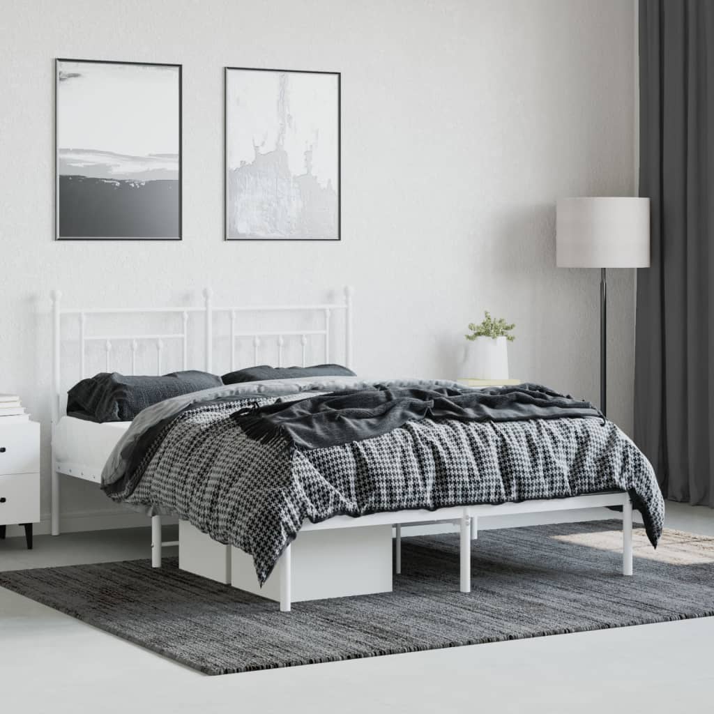 White metal bed frame with decorative headboard detailing