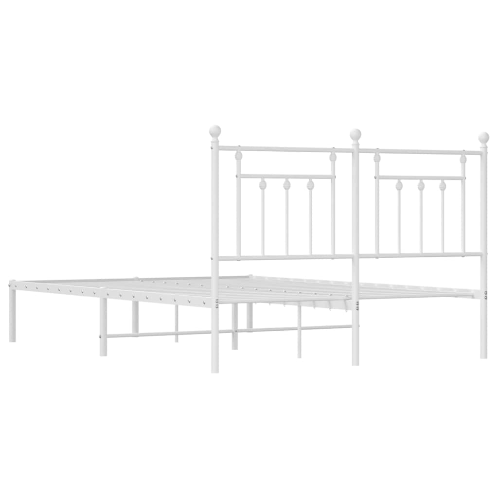 White metal twin bed frame with ornate headboard detail