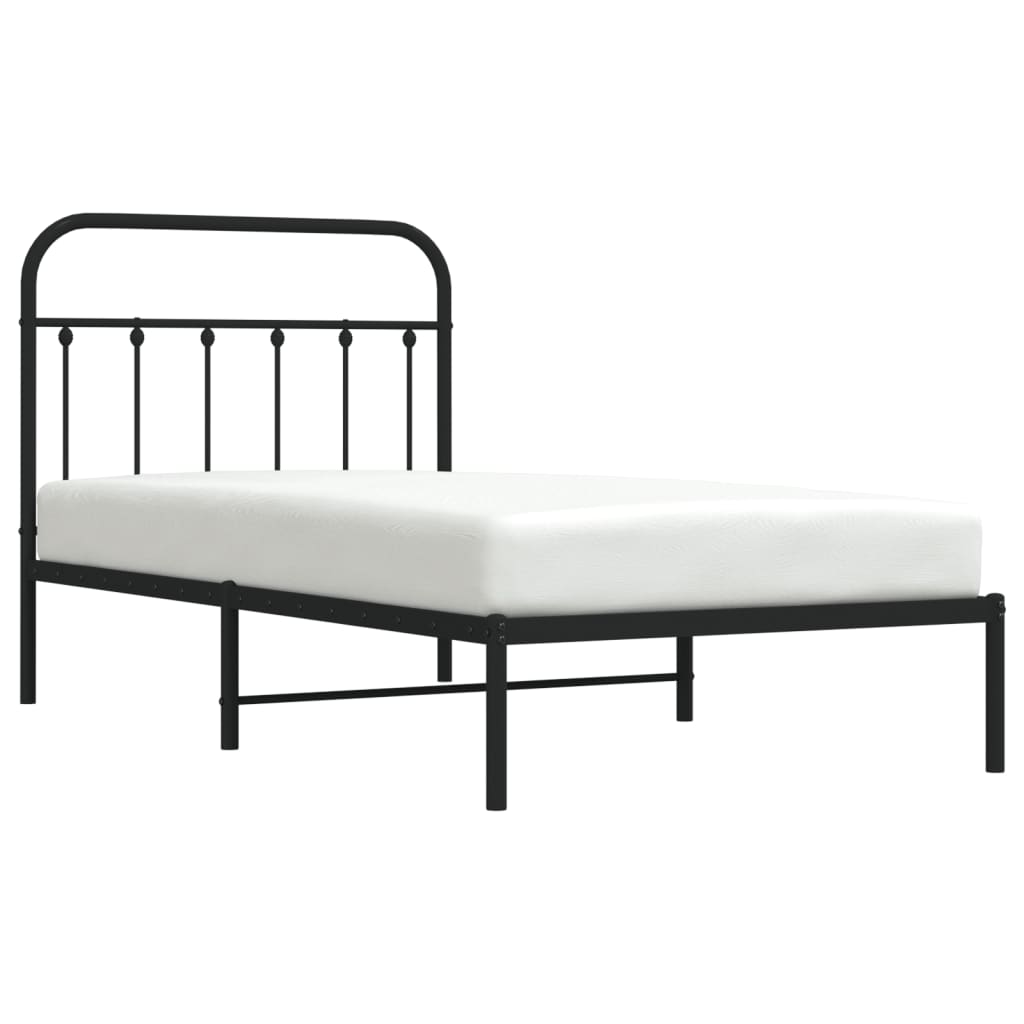 Black metal bed frame with decorative headboard