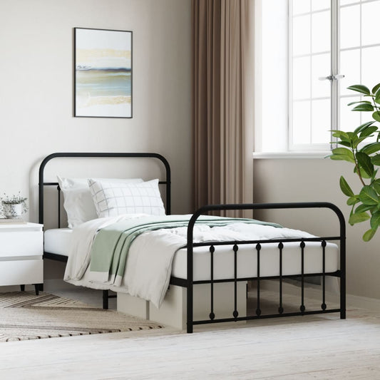 Classic black metal twin bed frame with rounded headboard and footboard