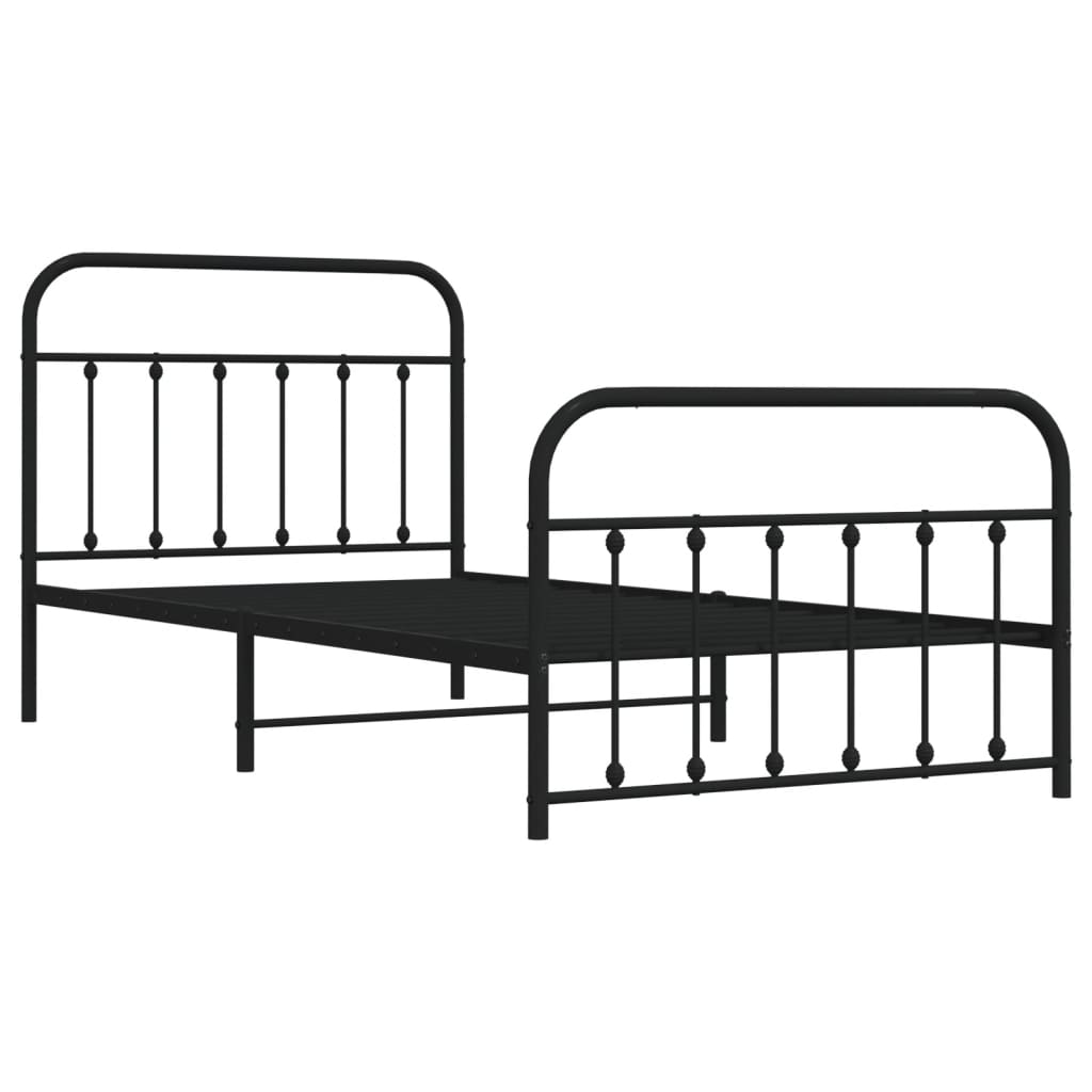 Black metal twin bed frame with a white mattress and a classic curved headboard and footboard design