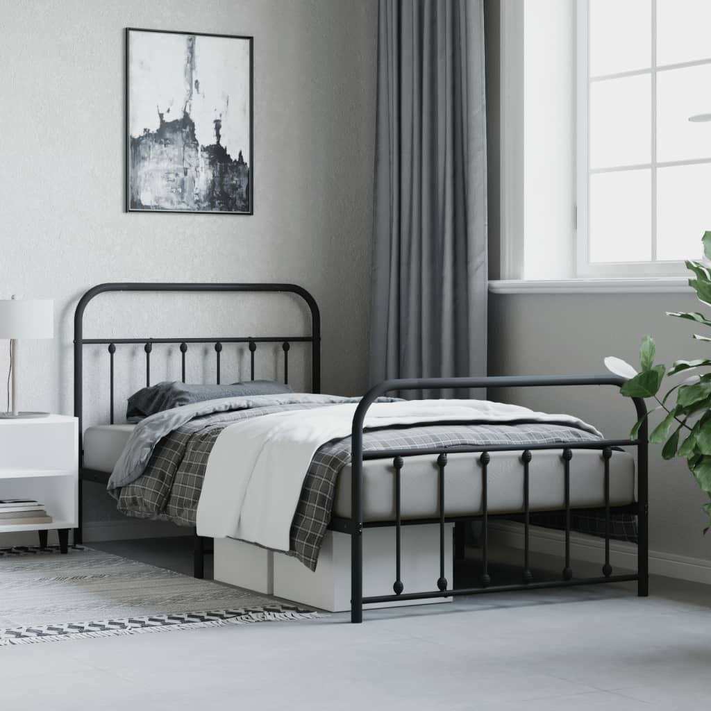 Black metal twin bed frame with curved headboard and footboard