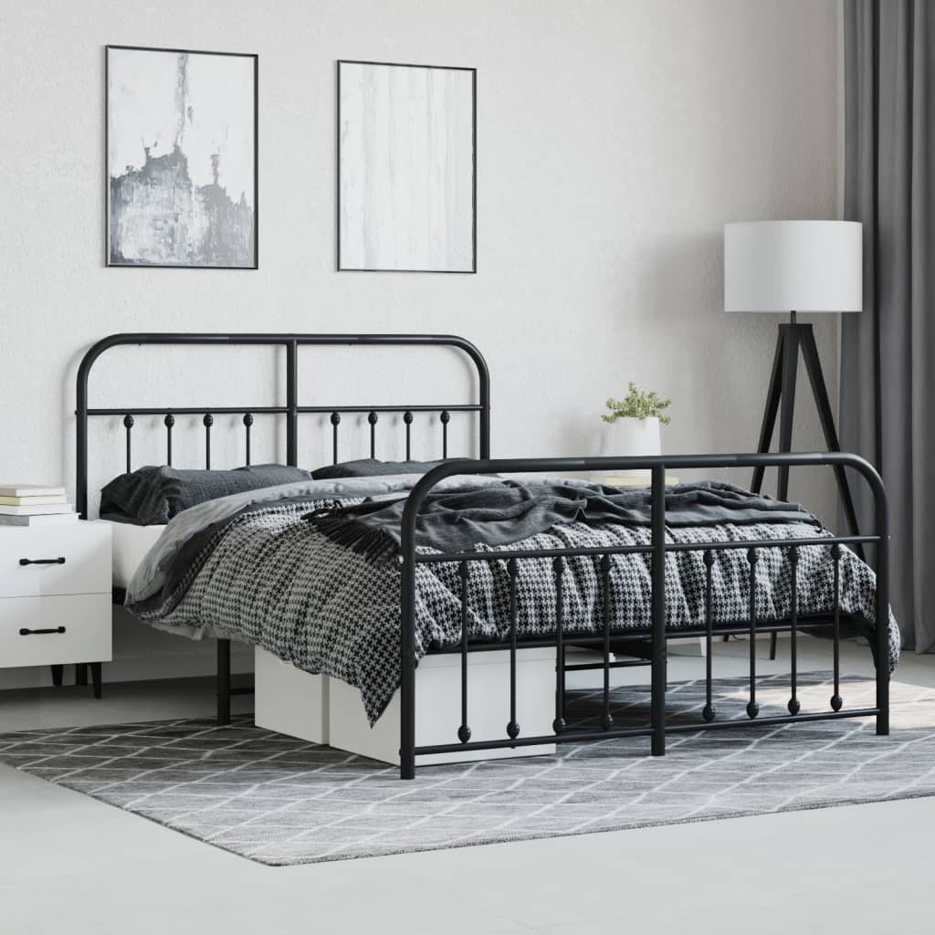 Dark grey metal platform bed frame with rounded headboard and footboard featuring decorative finials and a houndstooth duvet