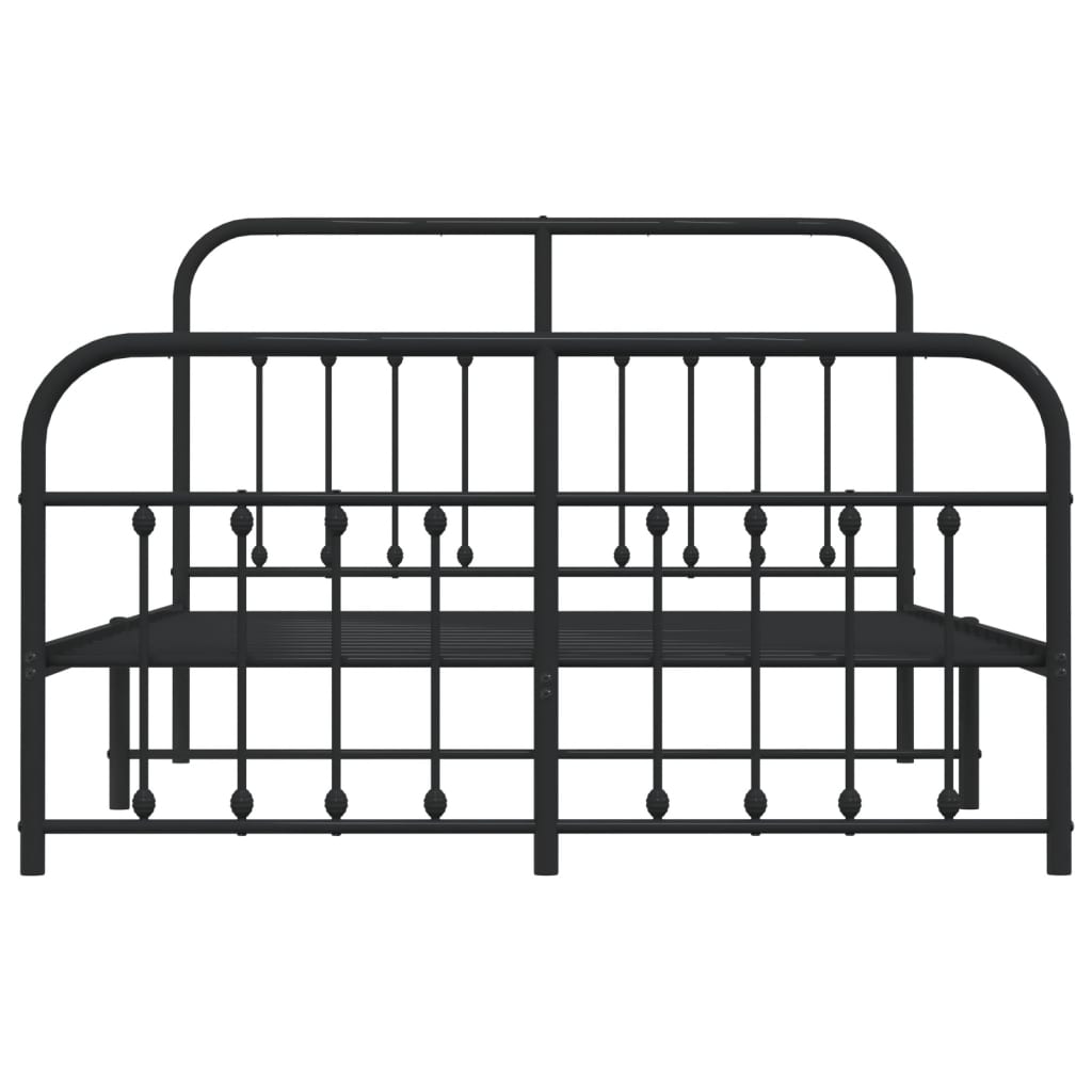 Black metal frame bed with a white mattress and ornate headboard