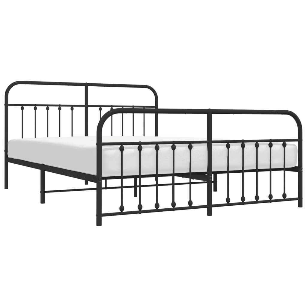 Black metal twin bed frame with decorative finials and slatted support