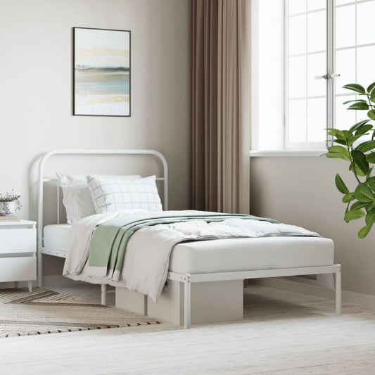 White metal twin bed frame with rounded headboard and footboard featuring a light brown herringbone throw blanket