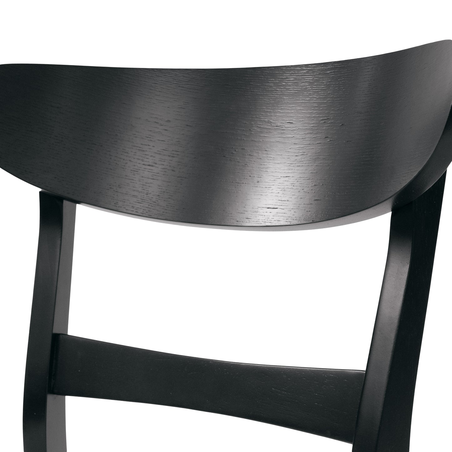 Black wooden chair backrest with curved profile and visible wood grain