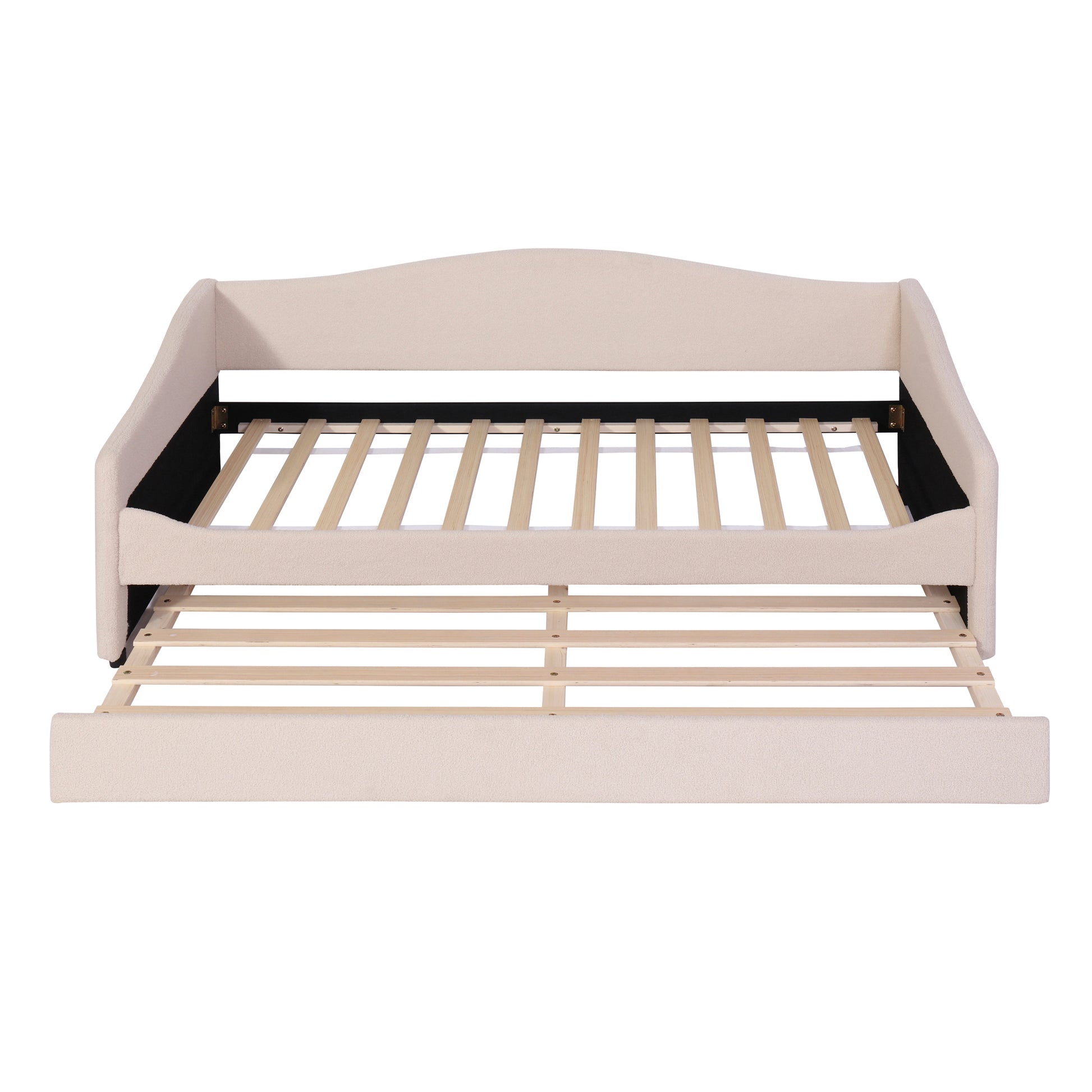 Cream upholstered daybed with a pullout trundle and slatted frame