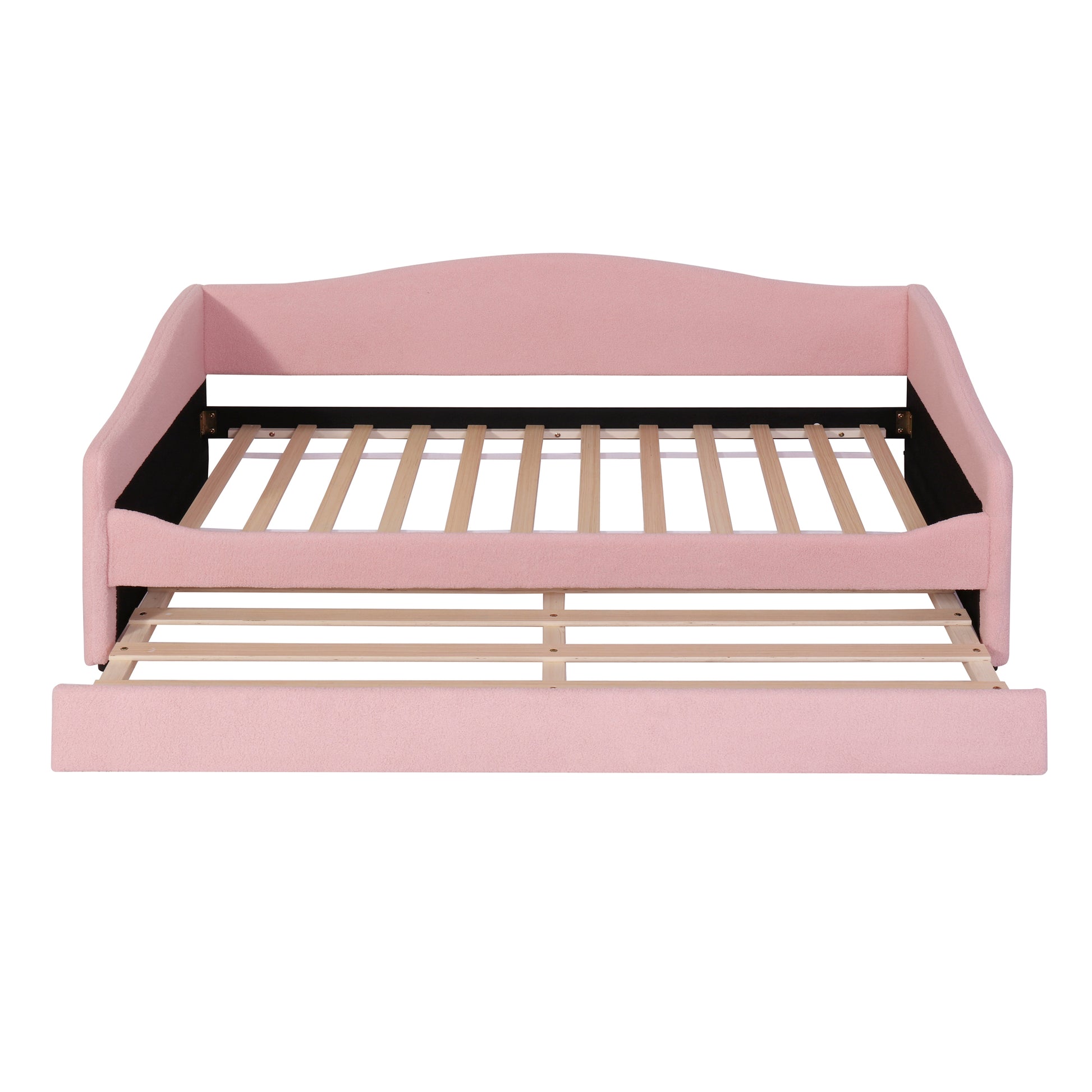 Pink upholstered daybed with pullout trundle and wooden slats