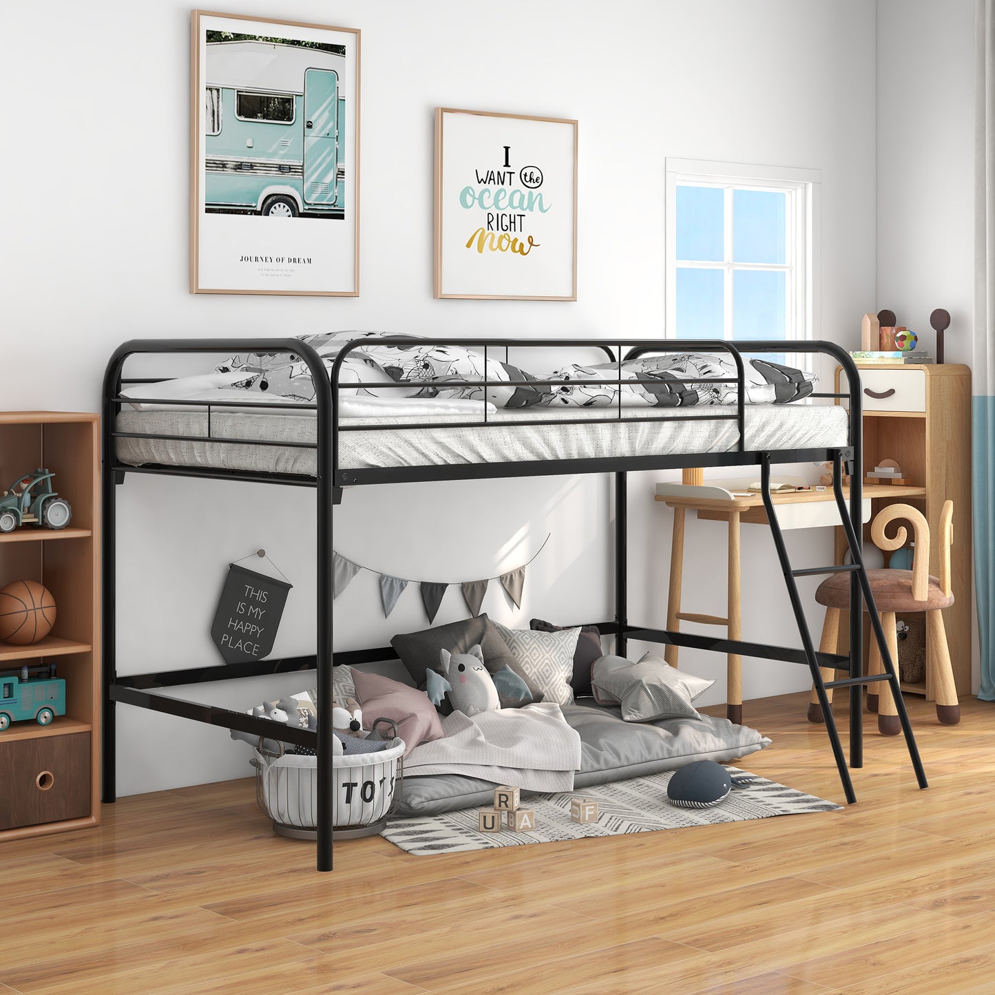 Black metal loft bed with mattress and bedding in a childs room