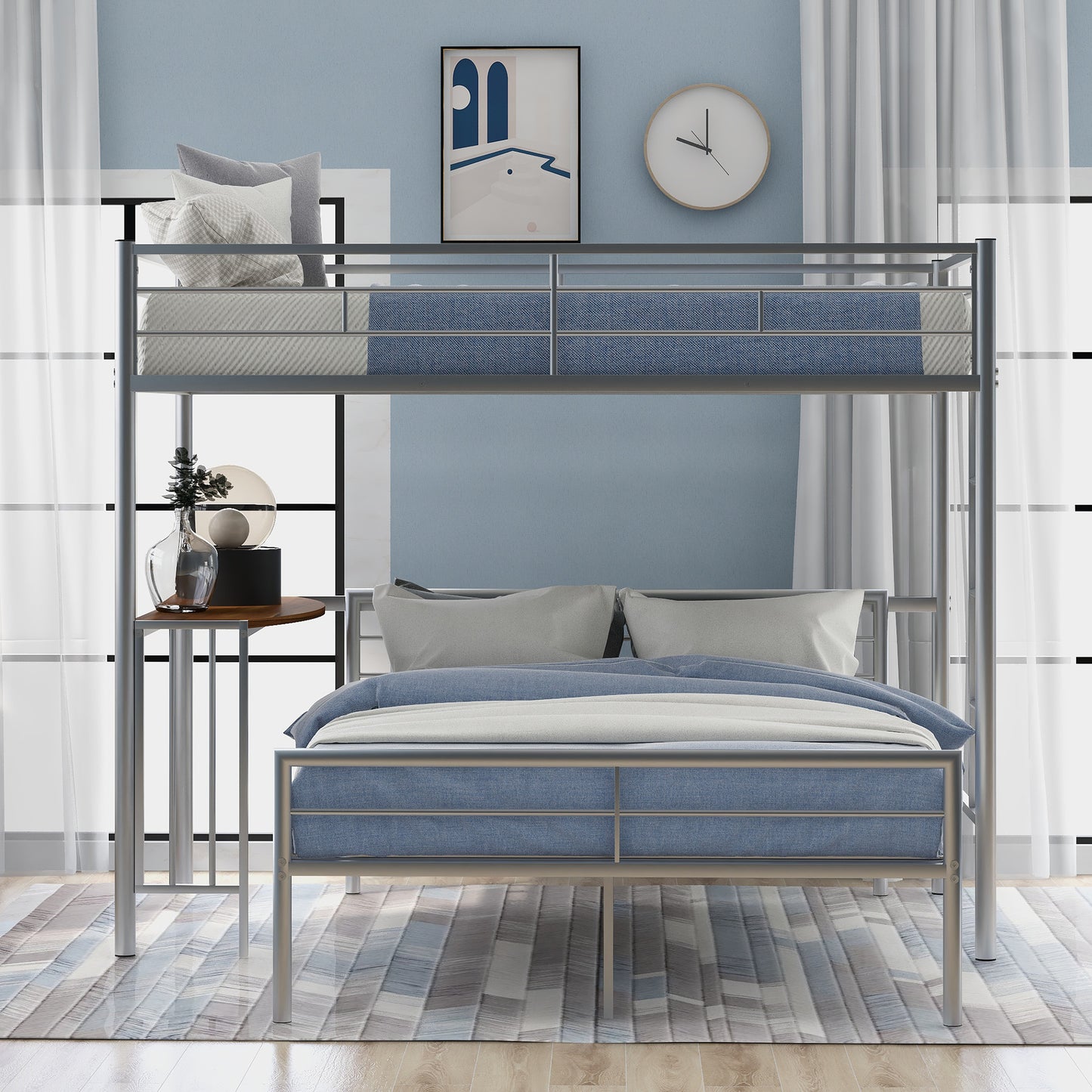 Silver metal bunk bed with blue mattresses and grey pillows