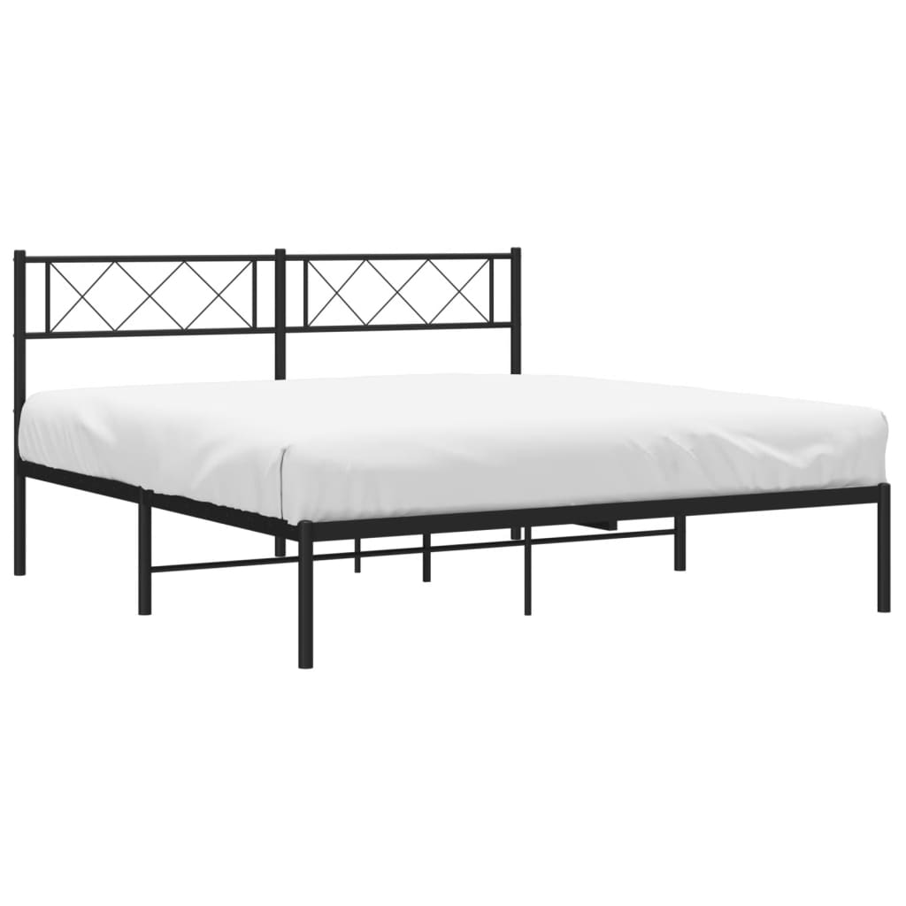 Black metal bed frame with a geometric headboard and white mattress
