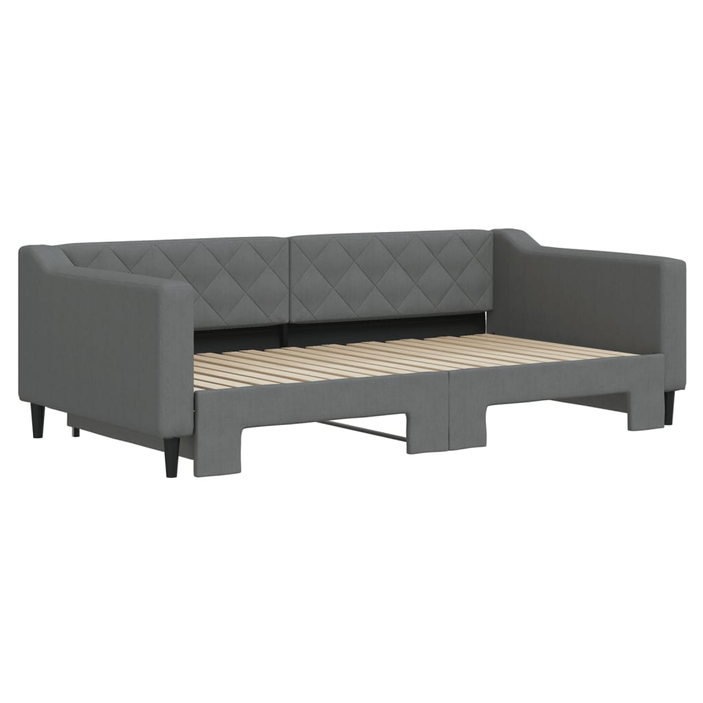 Gray upholstered sofa bed with diamondstitched backrest and pullout mattress frame