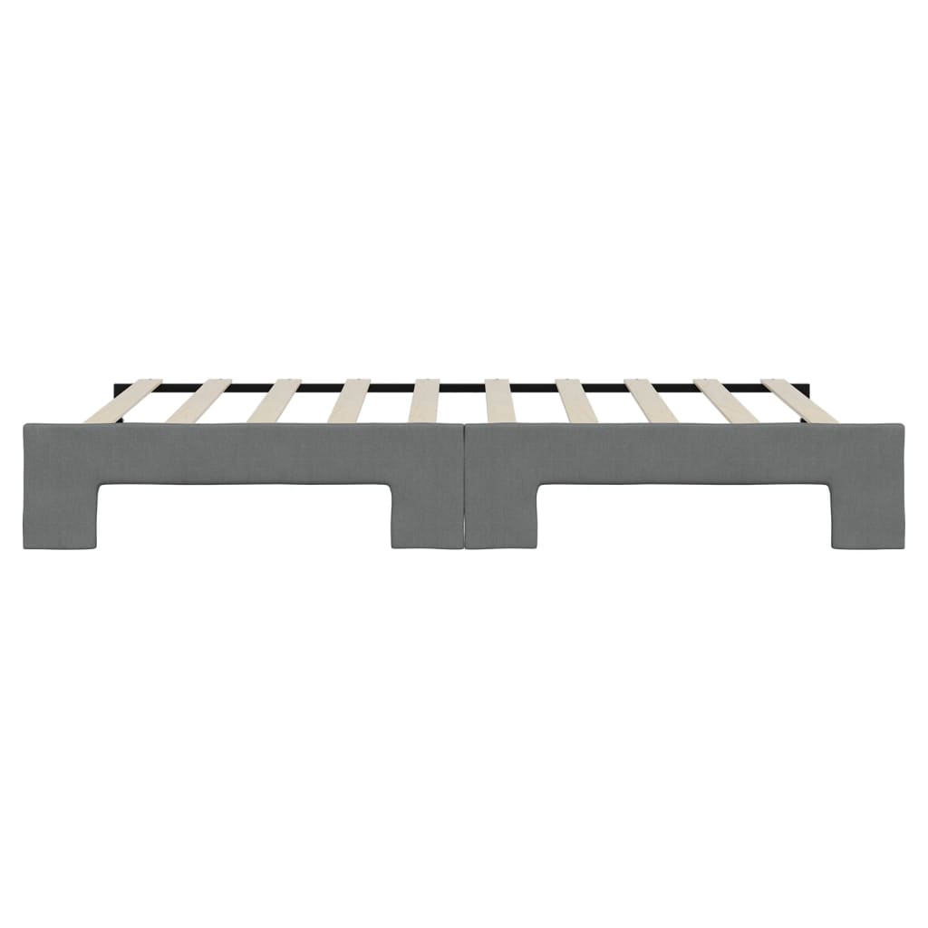 Grey upholstered twin bed frame with wooden slats
