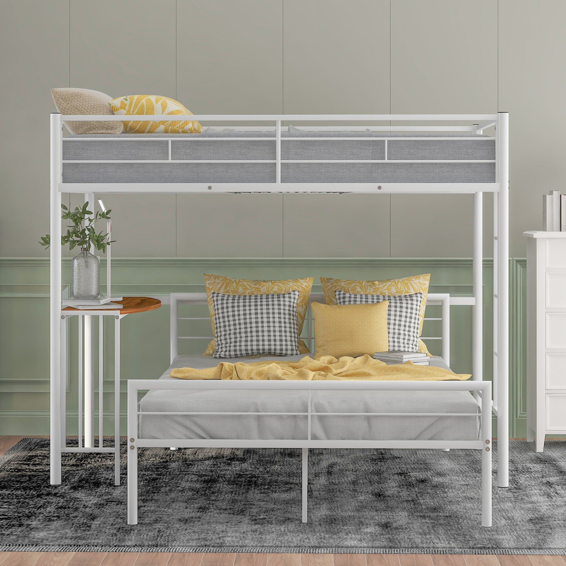 White metal twin over twin bunk bed with attached desk and gray mattresses