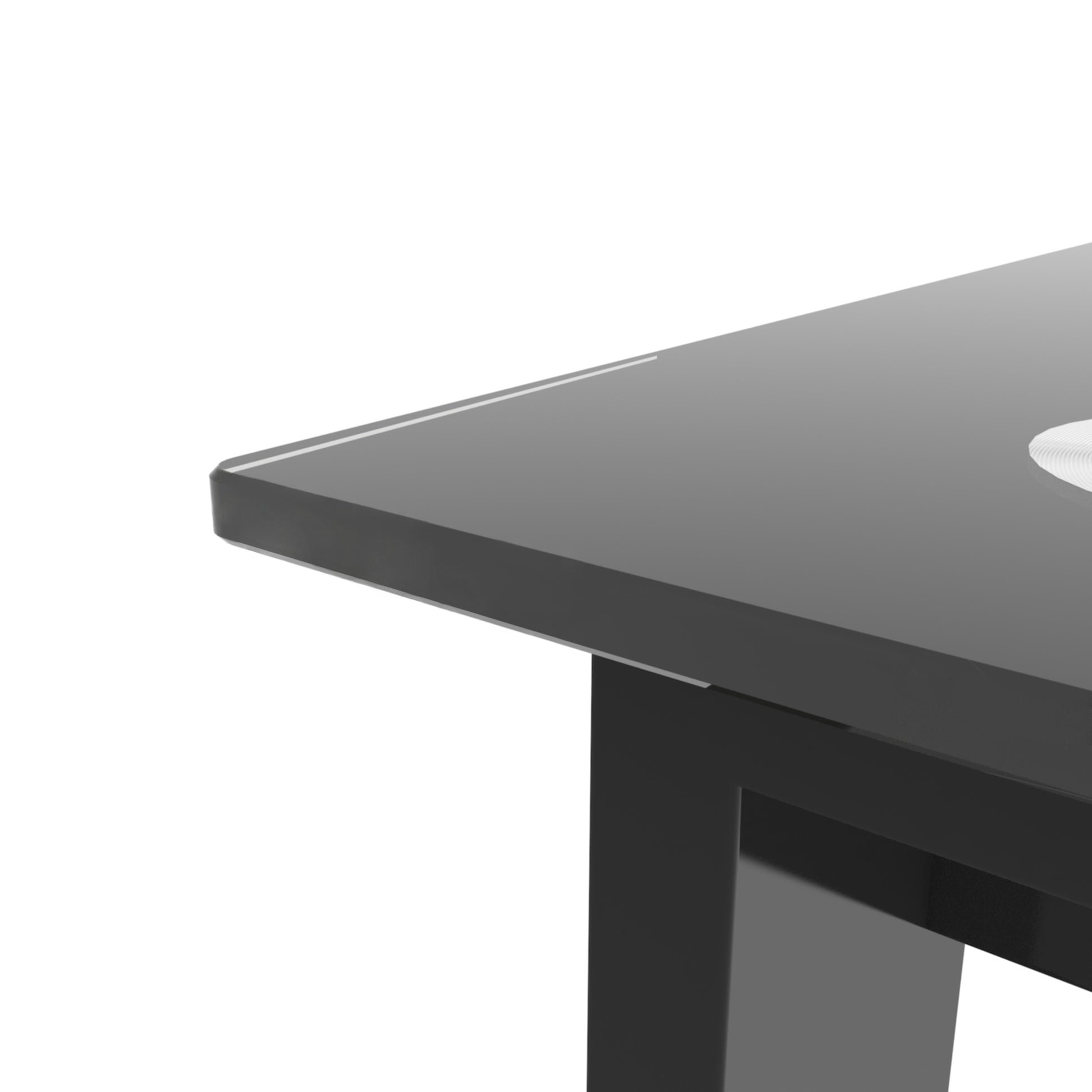 Glossy black dining table corner with silver inlay