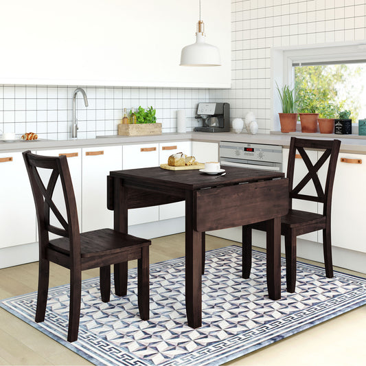 Dark wood dropleaf dining table with two crossback chairs on a geometric rug