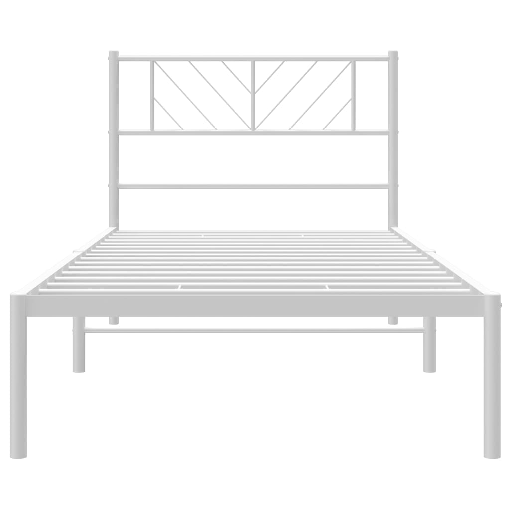 White metal twin bed frame with a geometric headboard and white mattress