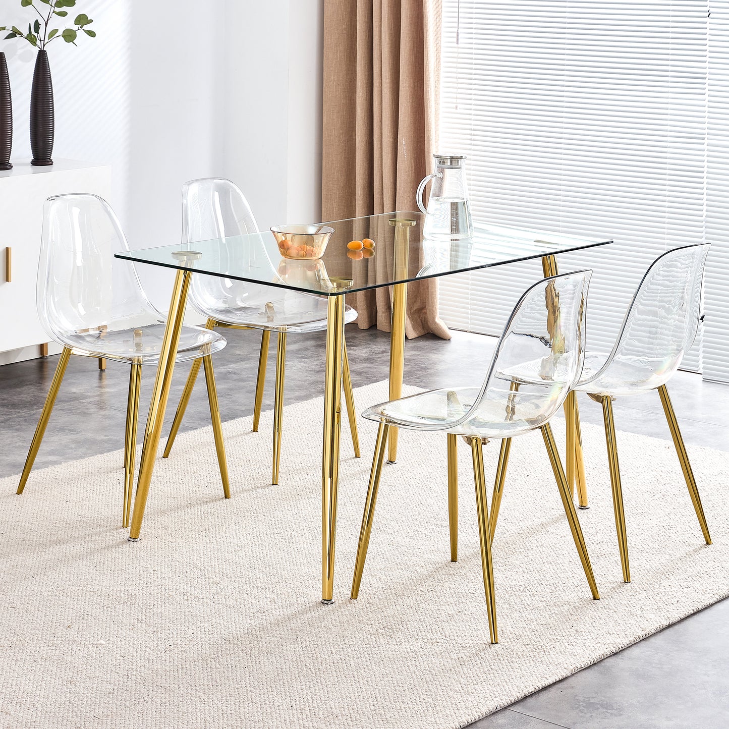 Clear acrylic dining chairs with gold legs