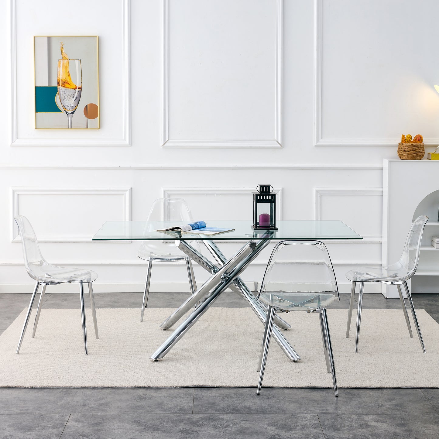 Modern glass top dining table with chrome Xbase and clear acrylic chairs