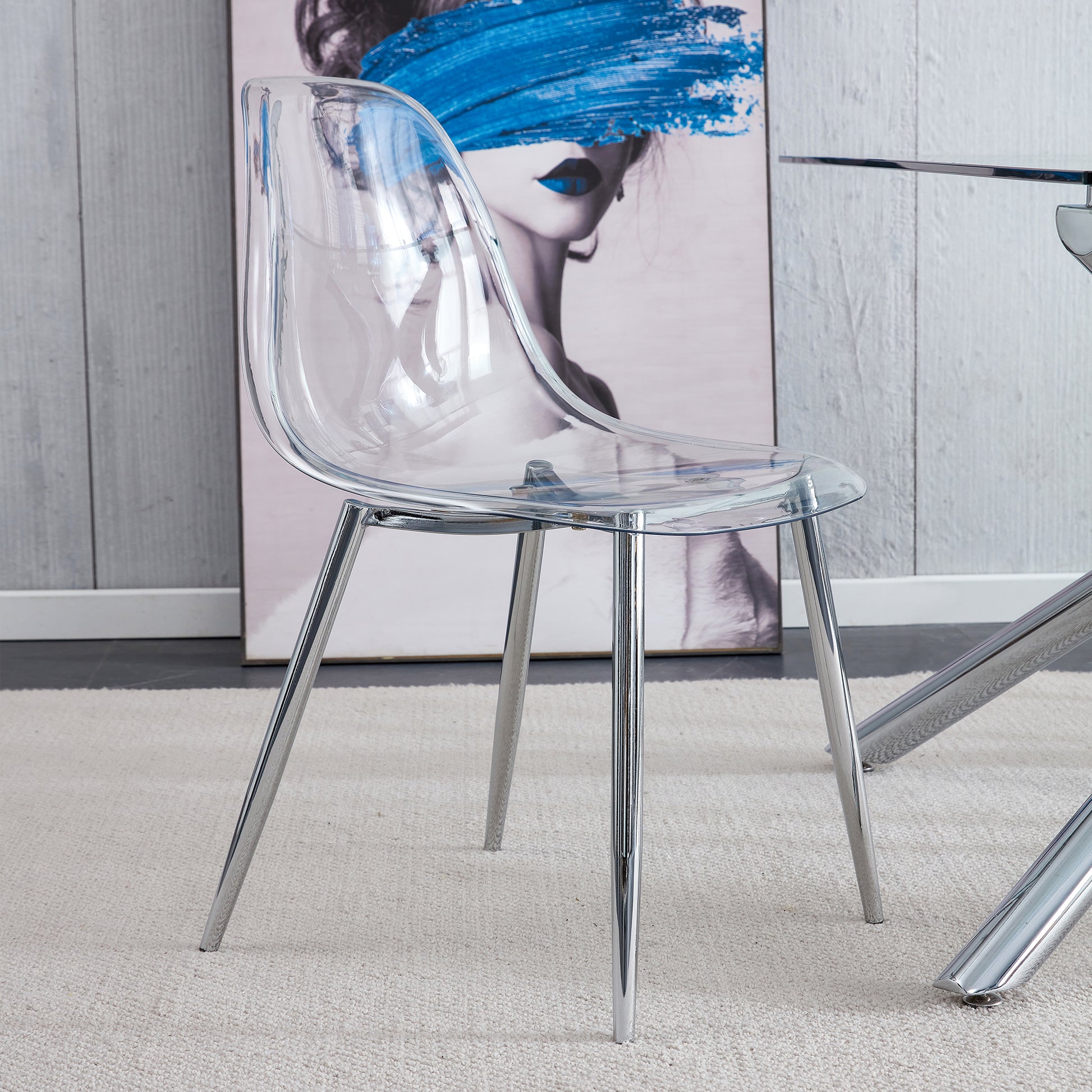 Transparent acrylic dining chair with sleek chrome legs