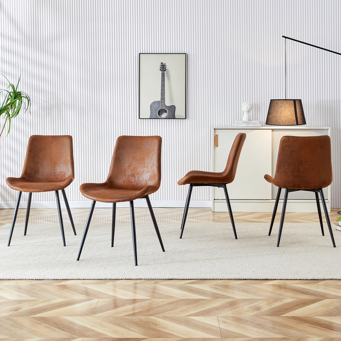 Brown faux leather dining chairs with black metal legs