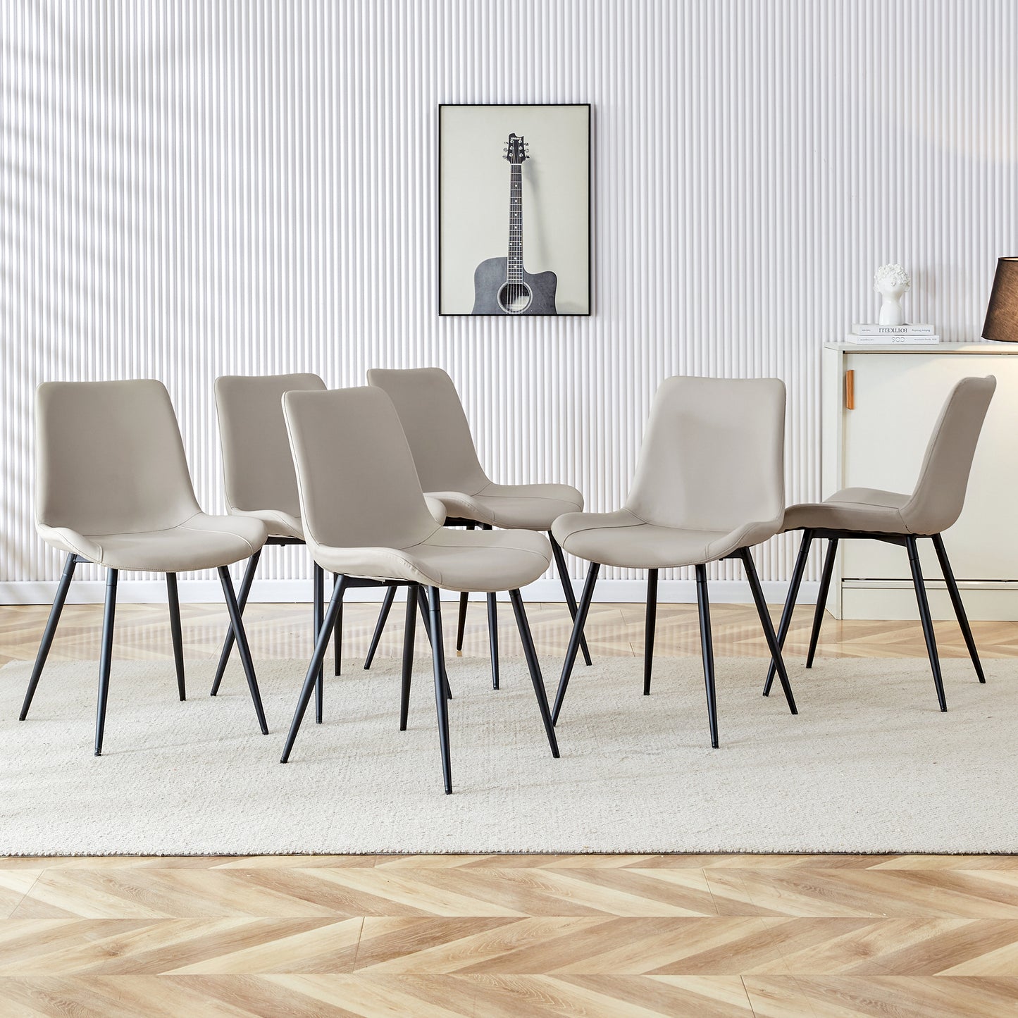 Set of six beige dining chairs with black metal legs