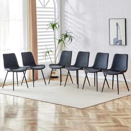 Set of  black modern dining chairs with slender metal legs
