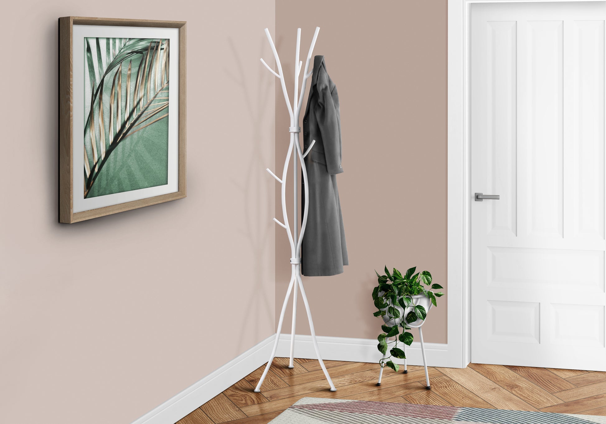 Modern white metal coat rack with tree branch design