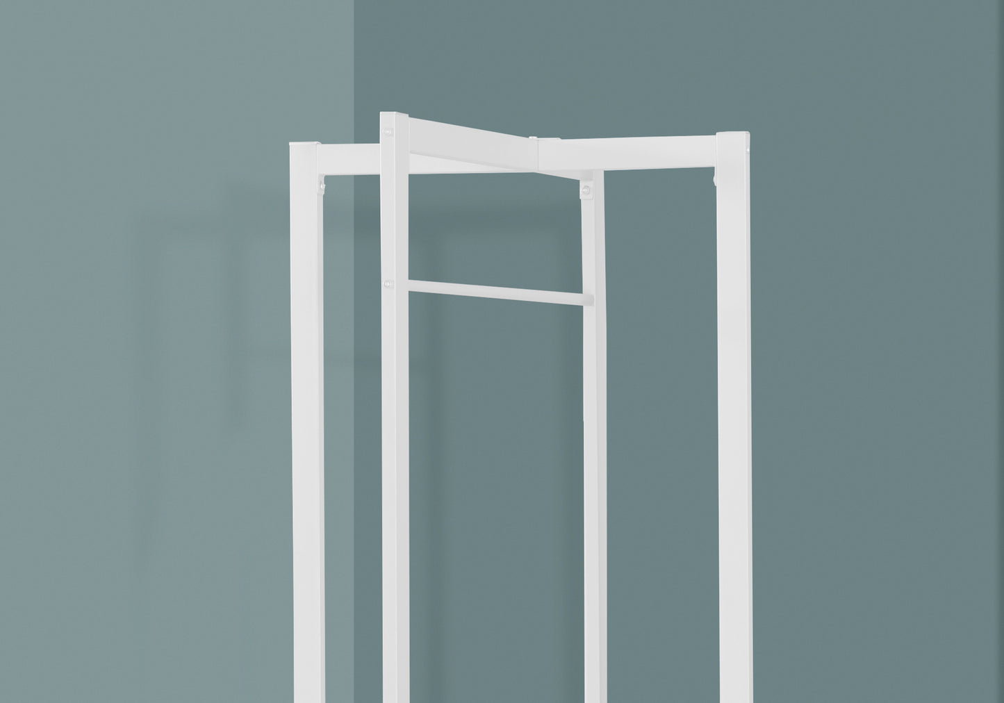 White metal garment rack with two hanging rods