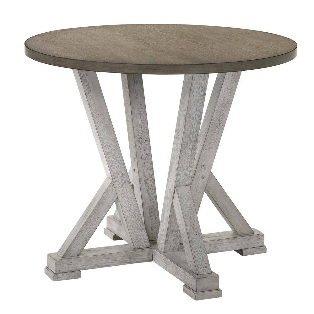 Rustic round dining table with distressed white base and grey wood top