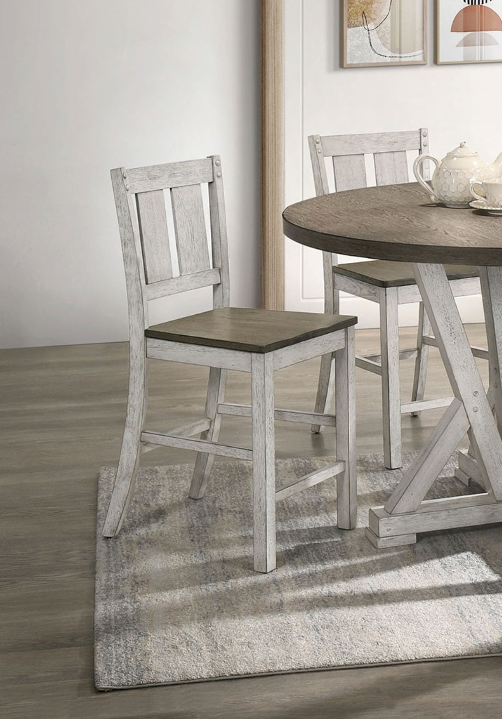 Distressed white wood counter stool with dark wood seat