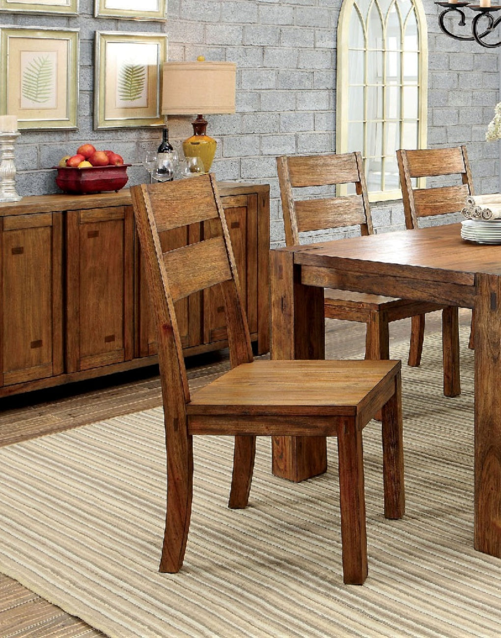 Rustic wooden dining chair with slatted backrest on a striped rug