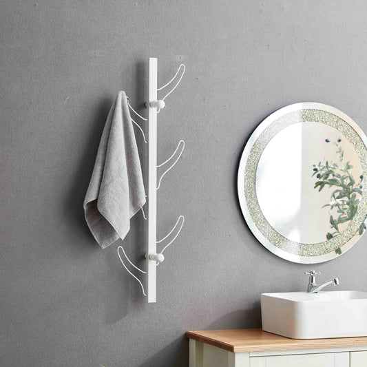White modern coat rack with curved hooks hanging a grey towel